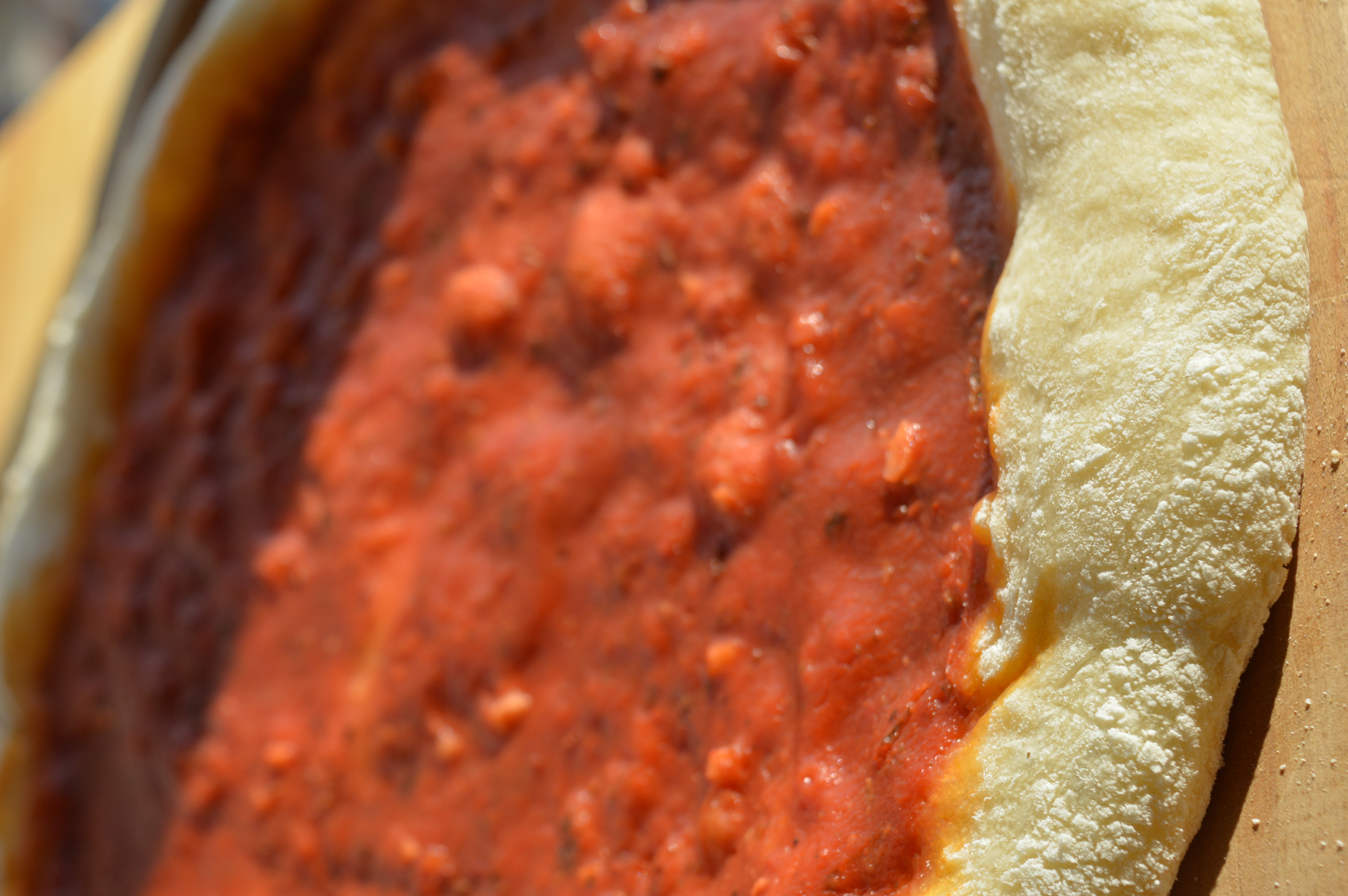 Detalle de una prepizza casera